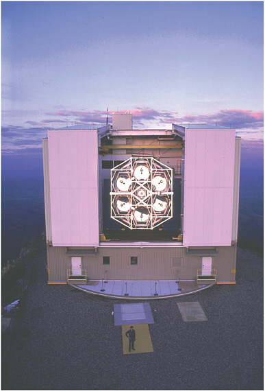 FIGURE 3.3 The six 1.8-meter-diameter mirrors that until 1999 composed the primary mirrors in the (old) Multiple Mirror Telescope (MMT). These mirrors now in storage are proposed for use in the CSS+ (see text). SOURCE: Courtesy of the MMT Observatory.