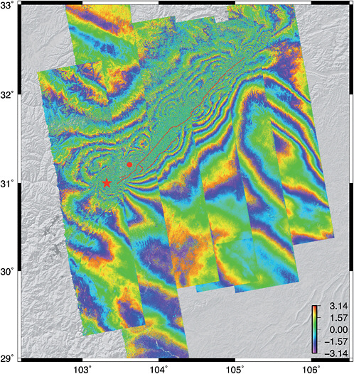 FIGURE 3.6 Ground deformation from ALOS L-band interferometry (each concentric color “fringe” corresponds to approximately 10 centimeters of displacement) due to the 7.9-magnitude Wenchuan earthquake, which occurred on May 12, 2008, along the western edge of the Sichuan Basin in China. Shaking from the 270-kilometer-long rupture destroyed thousands of structures, killing nearly 70,000 people and leaving more than 4.8 million homeless. ALOS-derived ground deformation maps were available within a few days after the rupture in order to assess the extent of the damage zone, as well as to provide an estimate of regions of increased seismic risk. SOURCE: David Sandwell, University of California–San Diego.